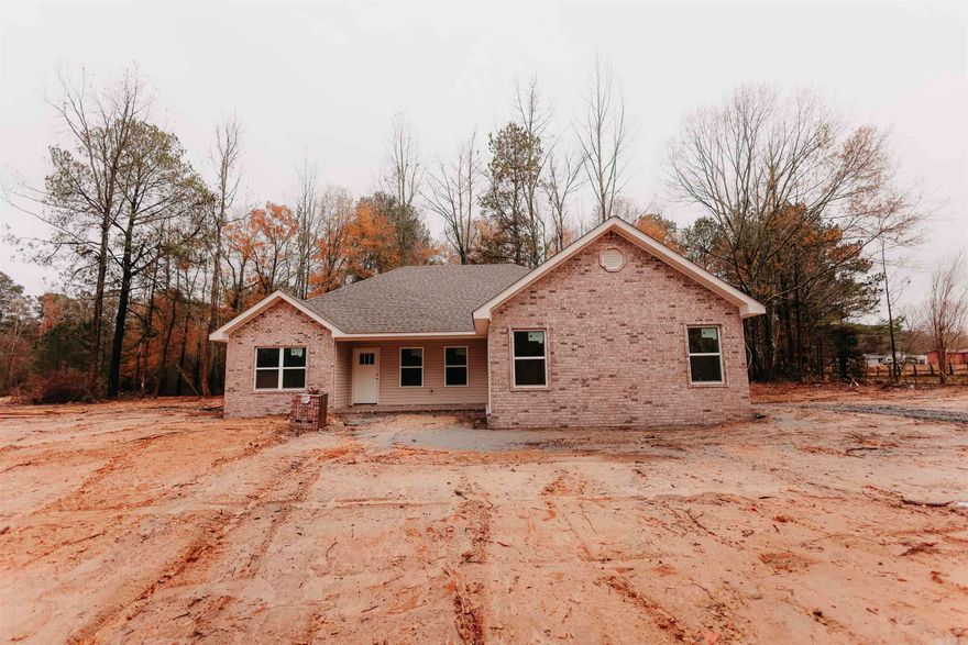 Charming 3 bedroom 2 bath home. This is the best floor plan. It maximizes your space. The lot is .80 which gives you some privacy from your neighbor. Split bedroom plan. Primary bedroom has a walk in closet. Primary bath features a large shower, seperate toilet area. Open living room, dining, and kitchen. Large laundry room with lots of storage. Locker area coming in from the garage. Nice private lot. Side loading 2 car garage. Quartz countertops throughout. Nice walk in pantry. You will not want to miss this awesome home. Seller will pay up to $5000.00 toward concessions with acceptable offer. Back on market at no fault of seller.