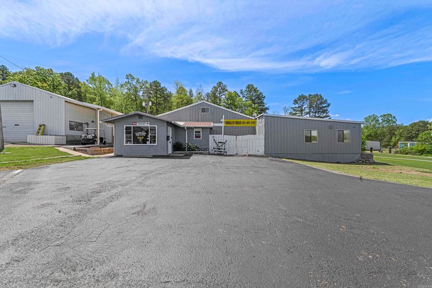 COMMERCIAL WITH RESIDENTIAL SPACE!!!!  Don’t miss this incredible investment opportunity in a high-traffic location near Dam Site Park and all the amenities Heber Springs has to offer. This thriving commercial property, currently operating as a successful Mobile RV Repair business, offers exceptional versatility and income potential. Spanning a total of 12,540 square feet, this well-maintained property includes: Two spacious garage bays perfect for repair or service operations. Retail storefront and office space ready for customer engagement. A large 1,920 sq ft attached apartment featuring a private entrance and a generous deck for relaxing or entertaining. Nine separate storage units, providing extra rental income. Covered parking and ample lot space for customers or business vehicles. Whether you're looking to continue the existing business or launch your own, this property is ready to go. The current business’s inventory is negotiable, making this a seamless transition for the right buyer. Take advantage of this rare find in a highly desirable location — a blend of commercial opportunity, residential comfort, and steady rental income all in one!