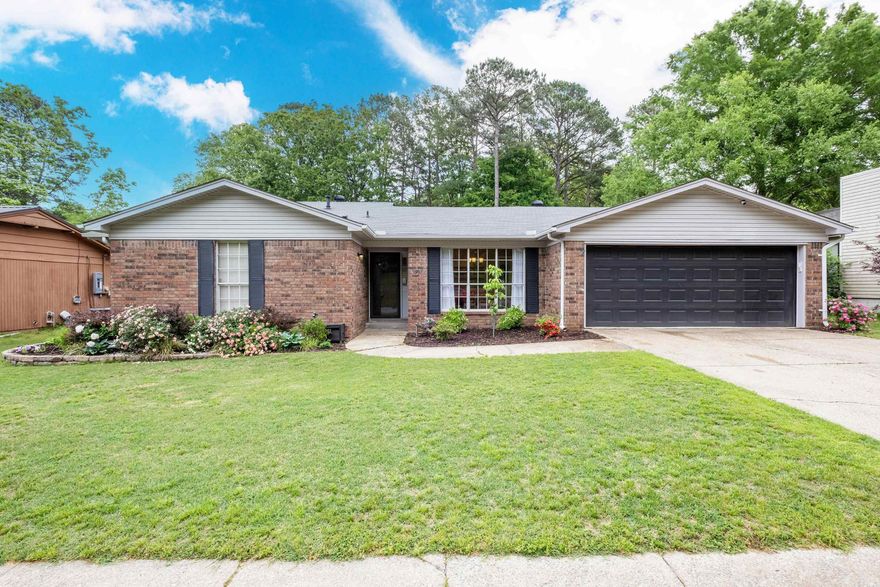 This charming single-level home in WLR sits on a level lot and is move in ready. Step in to be greeted by a vaulted ceiling in the living room with a wood burning fireplace and find updated LED lighting throughout the home. Enjoy a spacious kitchen with granite countertops, an eat-in breakfast area, & bar seating at the island along with under cabinet lighting & newer double oven. Have guests over and enjoy time in the formal dining room. All three bedrooms have spacious walk-in closets. The primary suite offers two closets plus an ensuite bath with double vanity and shower/tub combo. The hallway bath offers granite countertops and a shower/tub combo. Relax in the private backyard patio with multiple raised bed gardens and fully fenced yard with double gate. Flooring has been updated with easy to maintain LVP flooring throughout the main living areas, hallways, and primary suite. Additional highlights include guttering, french drains, a 2-car garage, generator ready along with updated electrical service. Recent upgrades include a 2024 Roof, HVAC 2021, a garage mini split from 2022, and multiple replaced double-pane insulated vinyl windows. Microwave and Garage opener 2021