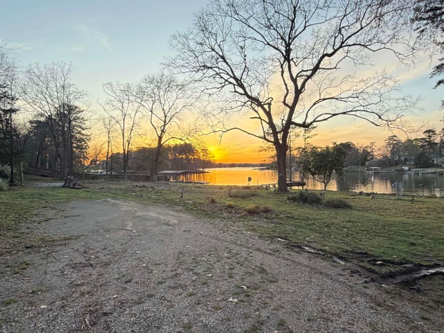Beautiful Lake Hamilton lot with great views and just minutes away from all your local needs.Nice level area to build your home. The lot is 1.37 acres with 200 feet of shoreline and all utilities on site. Adjoining lot is also available.