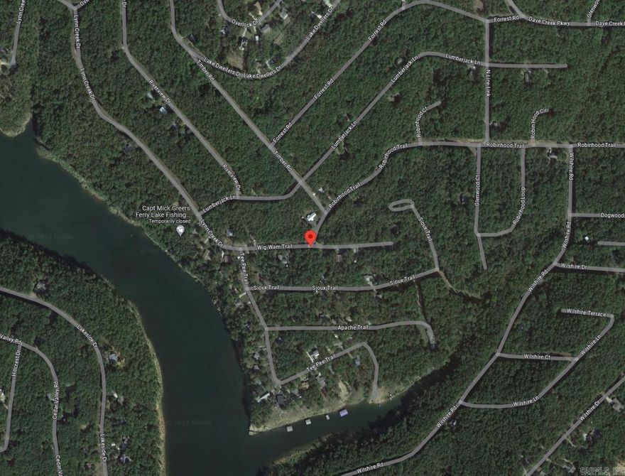 CHARTER MEMBERSHIP LOT!!!  Wooded Corner Lot near public boat launch at Greers Ferry Lake in Fairfield Bay.  Virtually level, and a great building site.  Sewer, water, & electricity available.  This is a CHARTER Membership lot that's transferrable to new Owner.  Dues are $25/yr.  Call for details about this type of Membership.