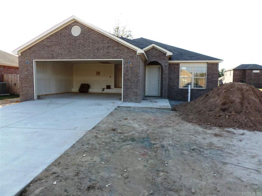 This newly introduced 3 bd/2 ba, all-brick plan, makes use of every square foot. Featuring a covered back porch, hardwood in the great room, to arched entryways; this home is ideal for families of all shapes and sizes. The master bedroom features a custom ceiling treatment, crown molding, a master bath with a separate shower and jetted-tub, as well as a sizable walk-in-closet. Kitchen highlights include raised ceiling height, Fridgedair smooth-top range, microwave, and dishwasher. Incredible location!