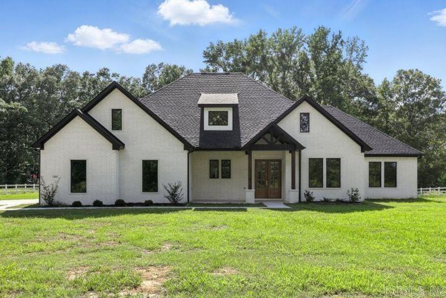This beautifully custom-built home is a must see! With 2.66 acres of land and over 3,000 sq footage this home is stunning! This home includes 3 large bedrooms, 2 full bathrooms, 1 half bathroom, and a bonus room/large office along with an additional unfinished attic space that can be converted into an extra room!!  The kitchen includes an oversized pantry, quartz counter tops, and a built-in gas stove. There is Luxury vinyl and custom tile throughout. The vaulted ceilings and beams are amongst many of the beautiful finishes. The laundry/mud room is fully equipped with lots of cabinet space and its own walk-in closet! This home has everything you need! Schedule a showing today! Offering up to $10,000 in incentives!