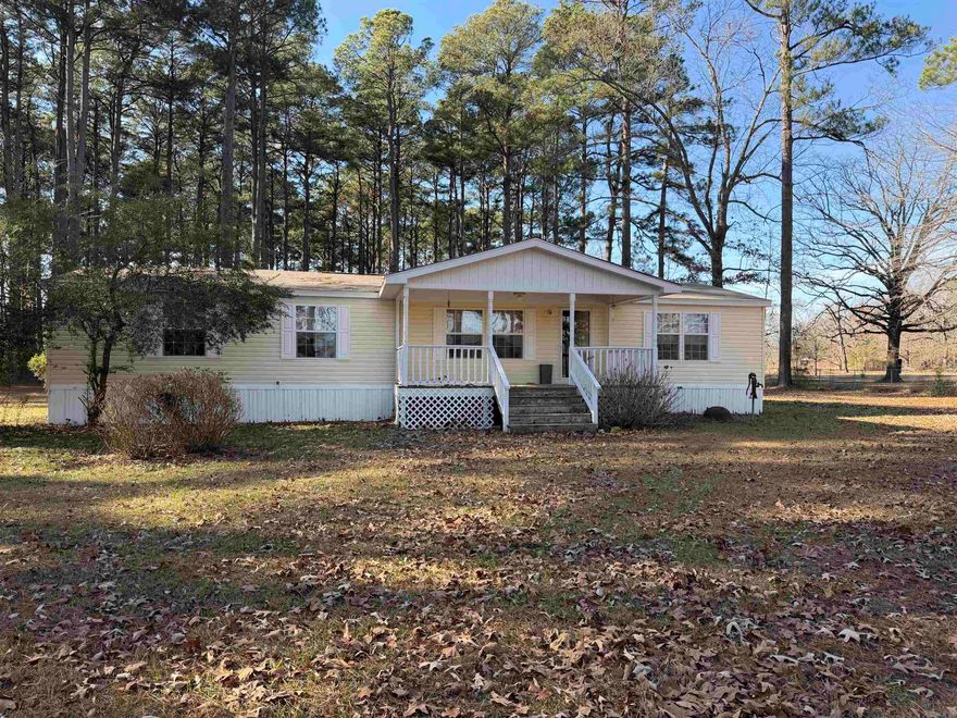 This mobile home sits on almost five peaceful acres, offering plenty of room to enjoy a quiet country setting with space for outdoor activities, gardening, or future improvements. The property provides a great opportunity for those seeking land with potential, whether for personal use or investment.  Adjoining this property is a separate listing that includes an older home in need of renovation that could be restored and used as potential income. That adjoining property also features an additional mobile home that will need to be removed, though the metal could be salvaged for scrap. Each property is being sold separately, allowing buyers flexibility to purchase one or both to fit their needs.
