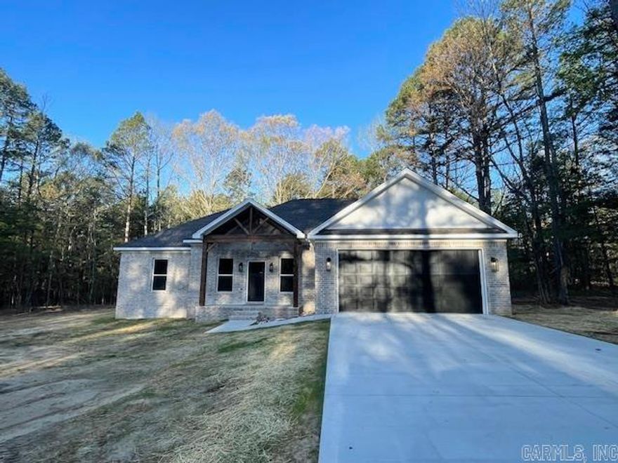 New Construction on 3 acres! This lot is deep and mostly wooded. Wilderness Road has very few homes and very little traffic. There is still time to pick out some of the finishes. There will not be any carpet in the home. Kitchen will have a corner pantry.  Covered back porch/patio. Option to purchase an additional lot with the home for a total of 6 acres.
