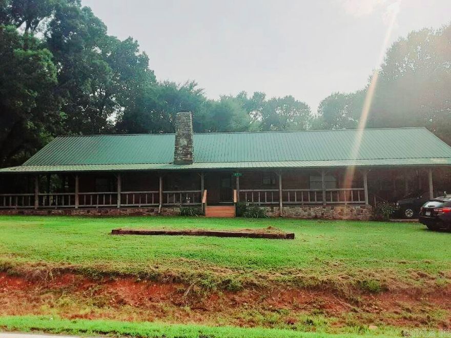 Gorgeous  log home in Ouachita School District!  This 3 bedroom 2 bath home boasts beautiful wood finishes throughout.  Enjoy your time outdoors sitting on the large porch overlooking the nicely shaded backyard.  All of this sitting on 4.56 acres for a peaceful country setting.  Schedule your private tour today!