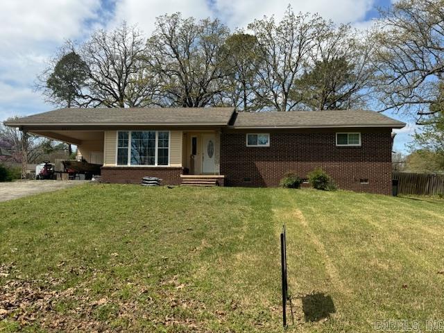 $2,500 SELLER CREDIT FOR RATE BUYDOWN!!!! Welcome to this charming 4 bedroom, 2.5 bath brick home built in the late1970's. With an open living area, updated kitchen and bathrooms, and a large primary suite, this residence offers both comfort and style. Inside, the open living area allows for seamless entertaining and quality family time. The updated kitchen features sleek countertops, a large bar/island with seating area, and ample cabinet space. Both bathrooms have been updated and provide enough space for the whole family with an additional half bath in the laundry room! The spacious primary suite provides a peaceful retreat, while the en-suite bathroom offers luxurious amenities including a large, tile walk in shower. Outside, the fenced backyard on the large, shaded lot is perfect for outdoor activities. Mature trees provide ample shade for hot summer days. Conveniently located in a desirable neighborhood, this home offers easy access to schools, shopping centers, and parks. Don't miss the opportunity to make this beautiful brick home yours. Schedule a showing today and embrace the joys of homeownership.