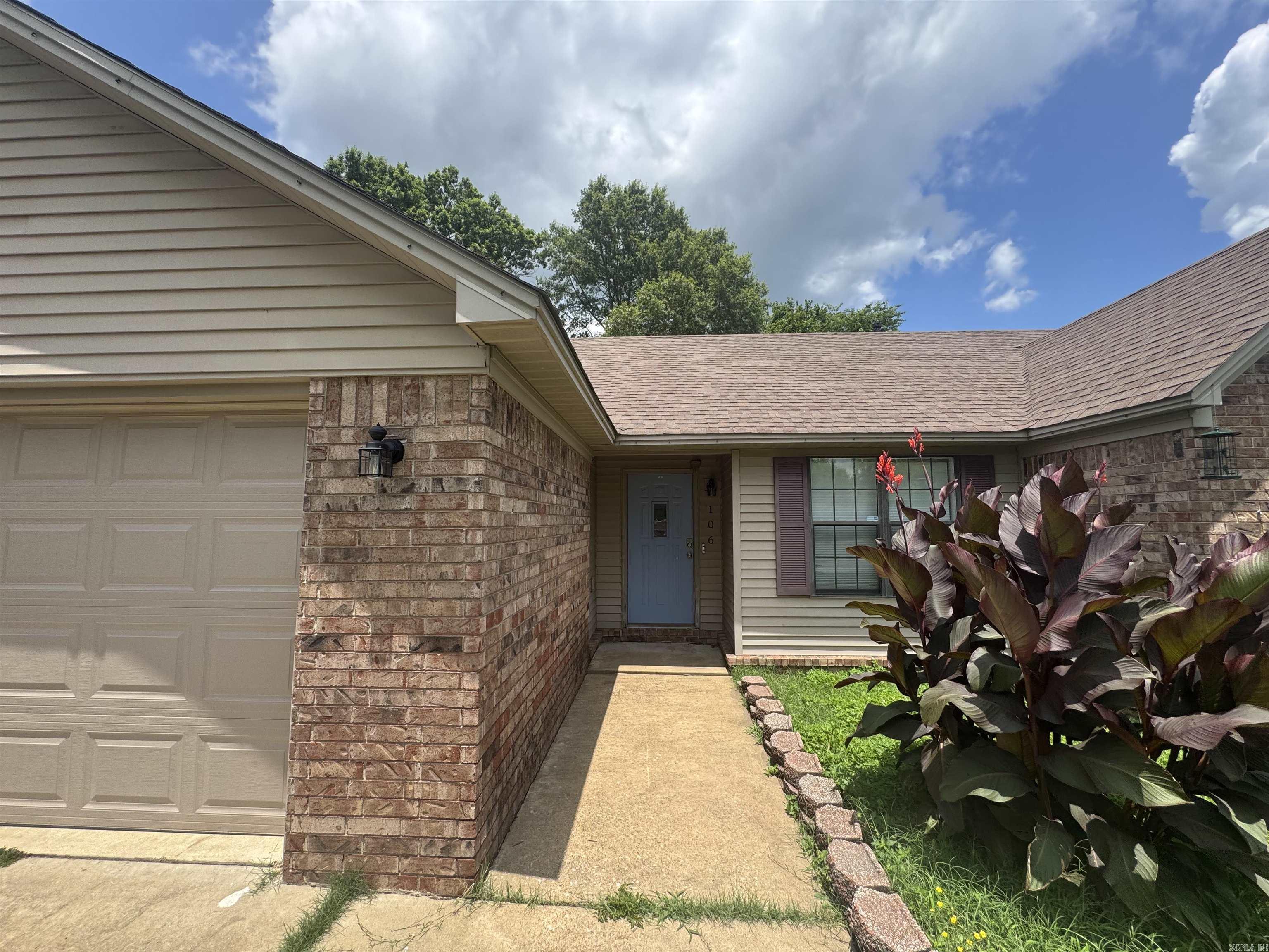 Charming 3-Bedroom Brick Home in Searcy! Welcome to 106 Louis Drive a well-maintained 3 bedroom, 2 bath home nestled in the desirable Fields Farm subdivision. This move-in ready property features a spacious living area with vaulted ceilings, low-maintenance tile and laminate flooring, and an abundance of natural light. The kitchen offers ample cabinetry and counter space, perfect for everyday living or entertaining guests. The primary suite includes a large vanity and a private bath with a spa-like tub, while two additional bedrooms offer flexibility for family, guests, or a home office. Step outside to enjoy the cozy patio and fenced backyard – ideal for pets, play, or relaxing evenings. Additional features include a brick exterior, an attached garage, and a quiet neighborhood location close to schools, shopping, and dining. Whether you're looking for your first home, downsizing, or investing, this property checks all the boxes!