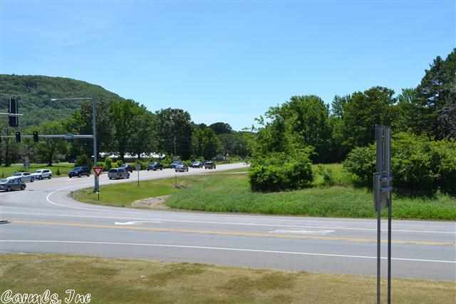 AMAZING COMMERCIAL PROPERTY FOR SALE!!! UNIQUE ONE OF A KIND PROPERTY! NORTHWEST INTERSECTION OF THE BYPASS(AR-25) & WILBURN RD(HWY 110). Property features high traffic count, red light, 3 dedicated entrances to Bypass & 1 dedicated entrance to Highway 110. If you are going to Greers Ferry Lake for recreation or just down to the Little Red River to fish, you have to drive by this property. Over 10 acres, owner financing available WAC. 4 Total entry points to property off of main road. No restrictions here!!