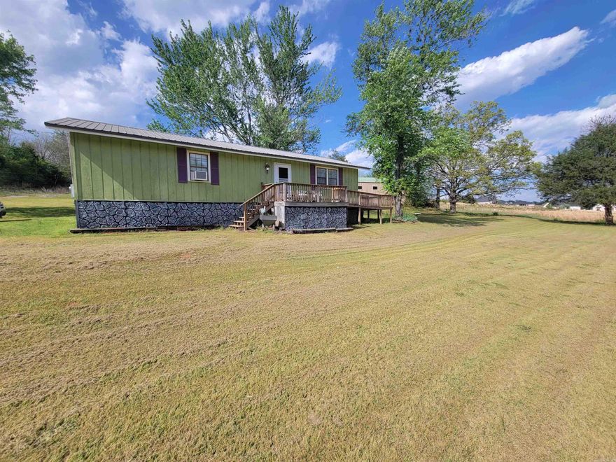Calling all investors! #4,#7, and #11 D and N Ln.  Location, Location, Location! 3 Lots, 3.12+- acres, 3 separate septic systems, water meters, and electric meters.   #4 is the front home and is occupied.  #7 is the singlewide in the middle, and #11 is the home at the back of the property which is unlivable in it's current condition but could potentially be renovated.  In addition to 3 potential homes/home sites, there is an approximately 1800 sqft shop, an approximately 400 sqft shop, 2 additional out buildings.  So much potential here!  Live in the front property while building your dream home in the back or pick up this property and have spots for 3 potential rental properties.  The list goes on - call for more details!