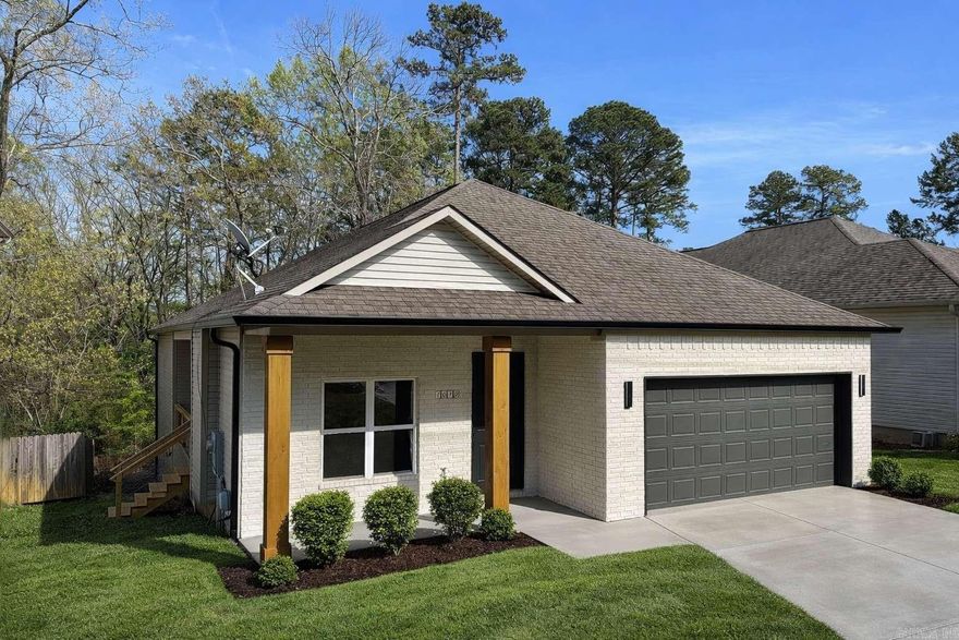 Welcome to this beautifully updated modern ranch-style home, offering comfort, style, and high-end upgrades throughout. The clean white brick exterior with warm wood accents creates standout curb appeal from the moment you arrive. Inside, you’ll find all-new luxury vinyl flooring, fresh interior paint, custom accent walls, updated lighting, and new ceiling fans—creating a bright, modern, and inviting space. The fully upgraded kitchen features brand-new appliances, stunning granite countertops, a modern backsplash, and stylish floating shelves, perfect for everyday living and entertaining.  Bathrooms have been tastefully renovated with new tile shower and tub surrounds, updated mirrors, and all-new hardware for a clean, contemporary feel.  Enjoy year-round comfort with a recently replaced HVAC system (AC and heating), offering efficiency and peace of mind. Outside, relax on the covered front porch, and take advantage of the attached 2-car garage and wide driveway for added convenience.  Located in a quiet, desirable neighborhood, this move-in ready home delivers the perfect blend of style, comfort, and value.