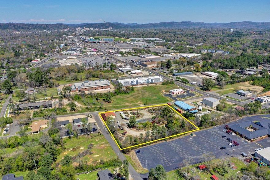 Investors Take note!! If you have been looking for the perfect location to put in a business-Check out this PRIME location! 3+ Acres one block off Central Ave (7 S) And Higdon Ferry road. With all the growth and development taking place right now, this is a highly desired easily accessible property. The possibilities for this property are almost limitless. Zoned C4 Neighborhood Commercial it is located only mins to Oaklawn Race Track & Casino. Along with the 3+ acres are a 2000 sq ft office building, a 40X50 building (which is being used as storage. See the sketch in the photos. Built in 2011 at a cost of $50,000. Close to Lake Hamilton, to all amenities, banks, grocery,fine and fast food dining. Minutes to hop on the bypass and be headed to Hot Springs Village, Little Rock, Texarkana, etc. Hot Springs is no longer a hidden secret, the word it out. Lovely town to vacation, with beautiful lakes, downtown area with shopping. Bath House Row, Promenade. Mid America Park Museum, Garven Woodland Gardens.