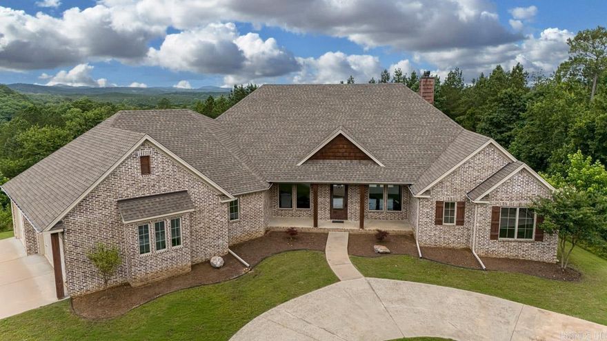 This stunning custom built home offers tall ceilings, open floor plan, large master suite, office/nursery/workout room off the master, large pantry, guest rooms are separate, 4 bedroom is designed as a large game room, ss appliances, gorgeous solid countertops throughout, tankless water heater, large windows allow natural light to flood the house, whole home generator, large covered patio, outdoor fireplace and grill, 40x 60 shop with #3 12 ft by 12 ft overhead doors, 3 car side load garage with sink mud area.  Fiber internet service available. Additional 65 acres are available to purchase.