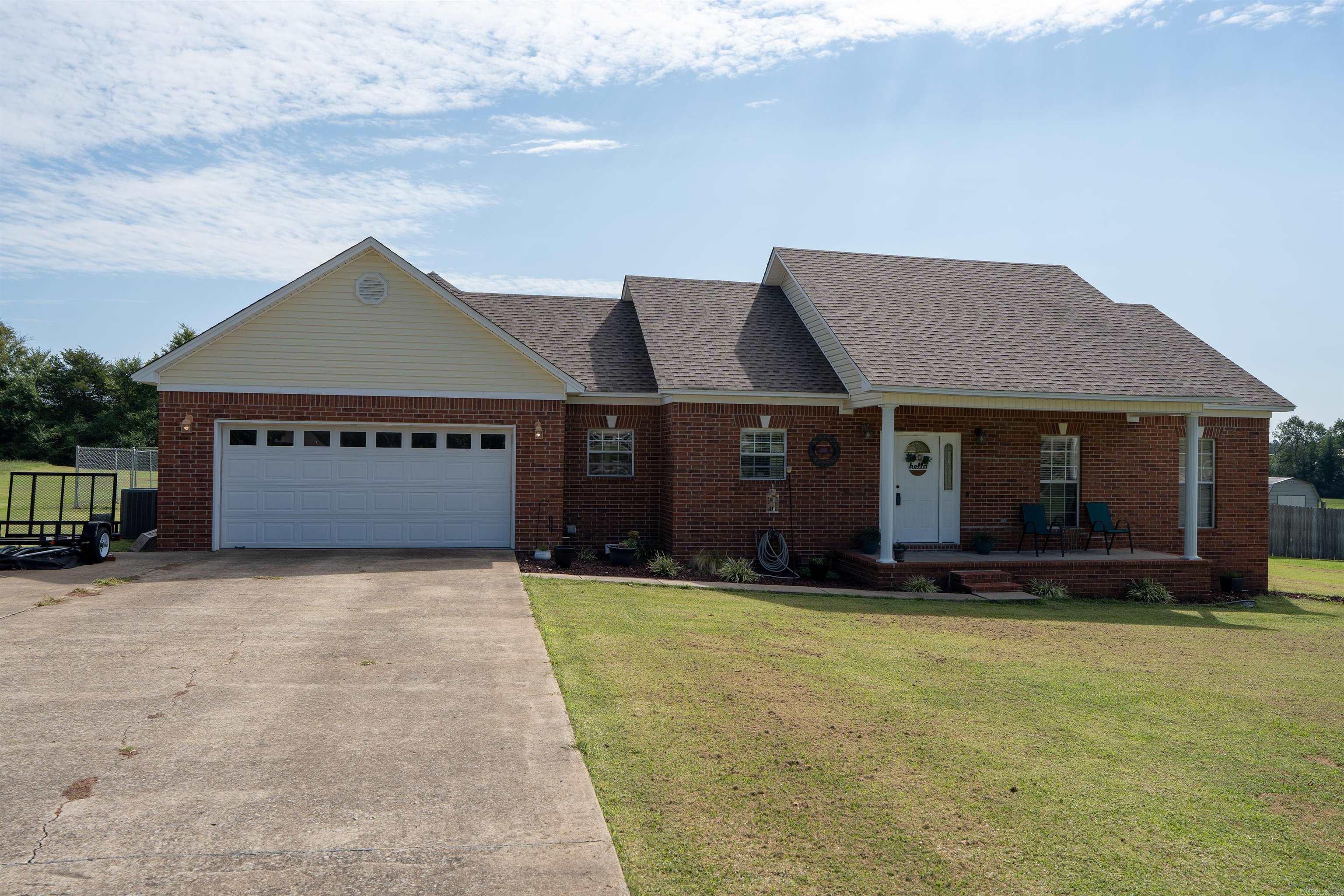 This inviting 3 bedroom, 2.5 bath home offers the perfect blend of comfort and style. The open-concept living, dining, and kitchen areas creat a spacious feel. The living room and primary suite feature elegant tray ceilings, adding a touch of charm. The primary suite offers an oversized walk-in closet, large bedroom and both a walk-in shower and soaking tub. Built with efficiency in mind, this all electric and energy efficient home hekps keep the utility costs low. Step outside to an oversized covered back porch overlooking a spacious backyard. Agents see remarks.