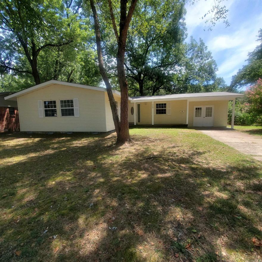 New LVP flooring in all rooms except for bathrooms which are tile.  Repainted interior makes this home shine on the inside.  Vaulted ceiling in livingroom, den,spacious laundryroom with closet.  Covered back patio, workshop with garage door on side. fenced backyard  No Property Disclosure available.  Seller has not lived in property. Accepted contract must be presented to Probate Court upon acceptance.  Please allow adequate time for final approval.