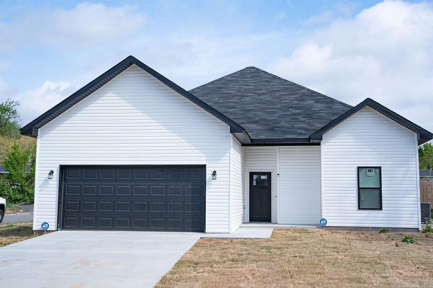 Stunning new construction home featuring 3BD/2BA with a 2-car garage. Enjoy an open floor plan with a spacious living area that flows into a modern kitchen—perfect for everyday living and entertaining. Stylish finishes throughout, including a mix of carpet and durable vinyl flooring. The primary suite offers a comfortable layout with ample closet space. Conveniently located near I-40 with easy access to shopping, dining, and more. Move-in ready—ideal for anyone looking for a low-maintenance, easy-to-love home!