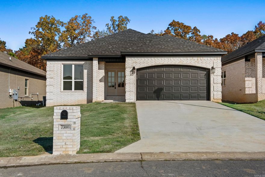 Affordable New Construction in Sherwood. This home is beautifully built with attention to detail. Covered porch in the front and covered patio in the back. All brick for easy maintenance. 9'-10' Ceilings throughout. Granite counter tops. Stainless Steel appliances. Crown molding throughout the home. Windows capped and trimmed. Walk-in master closet. LVP floors in living room, kitchen, and dining area. Custom tile in all bathrooms. Fireplace in the living room. All electric for easy maintenance.
