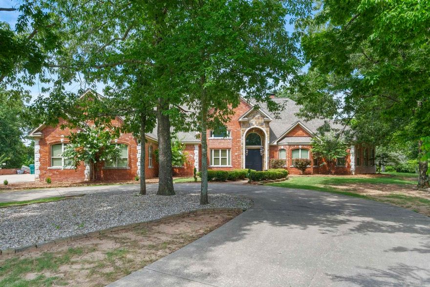 Welcome to your very own private retreat!  This incredible 5-bedroom, 4.5-bath home with a bonus room offers over 5,200 sq ft of living space, all set on 12 BEAUTIFUL ACRES with a stocked pond!  Built in 2006, this home combines comfort, function, and outdoor living in one amazing package.  Enjoy warm summer days by your saltwater pool, featuring a new pump and new salt converter, ideal for relaxing or entertaining!   Inside, the kitchen is loaded with updates including a new dishwasher, new ice maker, and one newer water heater. The very large pantry also serves as a storm shelter!  You will also find the beautiful primary suite on the main floor! Also, Stay comfortable year-round with a new a A/C unit!   This property also has a 1,500 sq ft shop that sits just steps away, complete with a full bathroom, kitchenette, and washer/dryer hookups. Whether you need a workshop, guest space, or a full in-law quarters, this space is ready to go!!  It also has a invisible fence installed if you have pups that love to roam!  This one-of-a-kind property truly has it all—space, upgrades, and endless possibilities!   Call me today for your private showing!