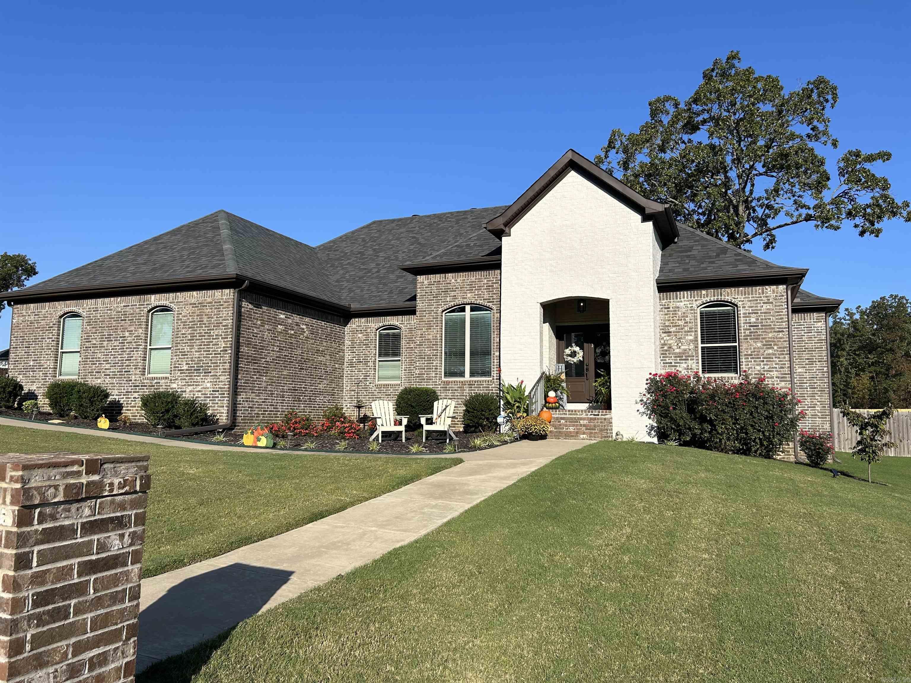 Welcome to 933 Millers Glen Drive; a beautiful all brick home on a 1/3rd acre corner lot in the desirable Millers Glen Subdivision. Forty paid off Solar panels with two Tesla batteries-one a Power Wall, provides for charging an EV overnight, or electricity during a power grid failure. Electricity bills are $35/mo. This contemporary one level home has 4 bedrooms and two baths, a wrap around master suite with walk in closet, "rain" and standard walk in shower, water closet and soaking tub, an open floor plan with double half reed Pella glass doors, hardwood floors, ceramic tile in bathrooms and laundry, granite countertops in kitchen and bathrooms, double sinks in both bathrooms and a split second bathroom, ceiling fans and lights with large custom closets in bedrooms, abundant kitchen cabinetry with pullout shelving, and much more. Come see for yourself!
