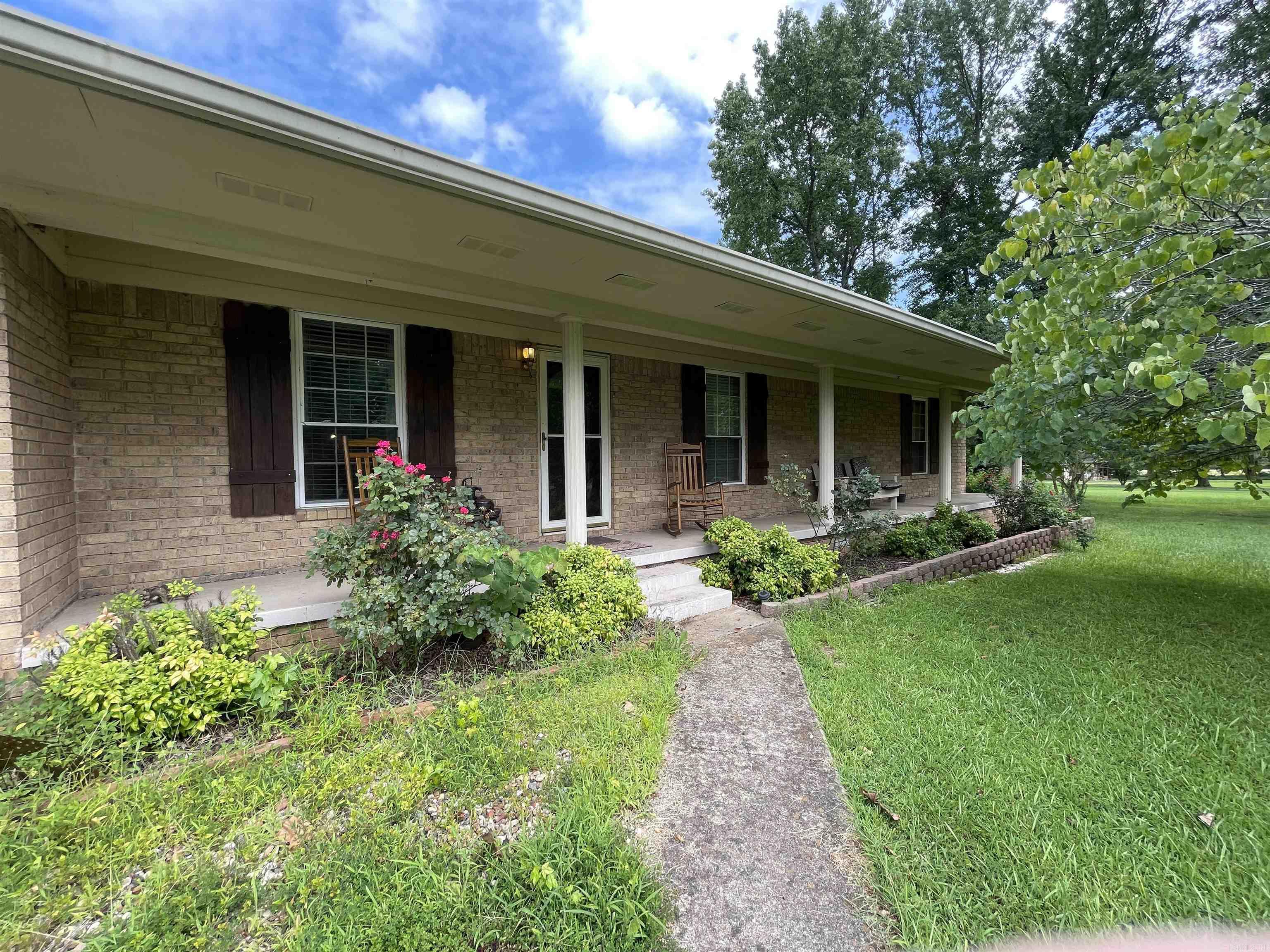 Come make this your new home today. Country home on 2.5 acres. Huge front porch, three living areas, two fireplaces, 30X40 shop! Super quiet neighborhood, sit on your covered back porch, listen to the fountain in the koi pond and watch the wildlife in the greenspace behind the home. Tons of storage and built ins throughout. Country living close to everything in Cabot. 15 mins to Air Force Base. Back yard is fully chain link fenced. Owner is needing to downsiz and is selling the home as is. Book your showing today, this is a great home in an excellent location.