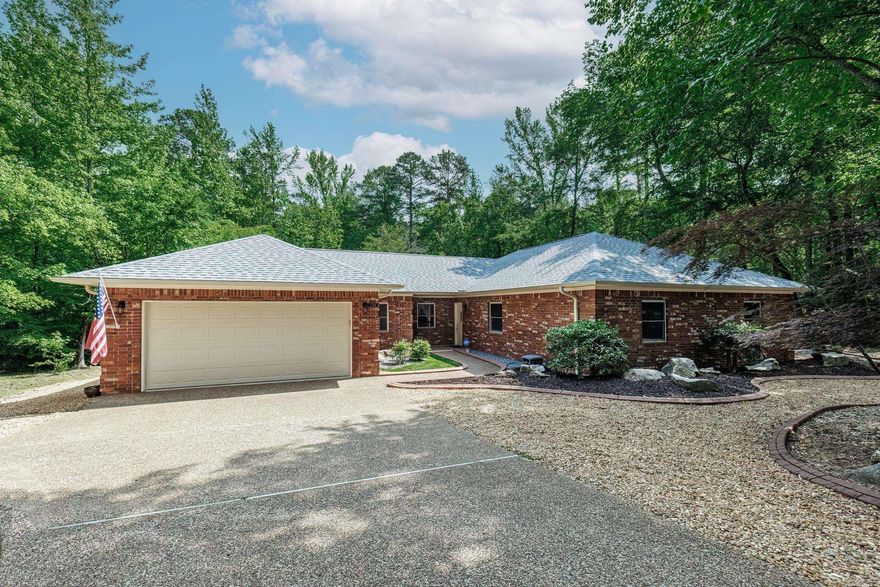 WELCOME to this charming, FULLY-Updated home that blends timeless character w/ modern conveniences! Featuring 2 spacious Master Suites, this home offers ample space for both privacy & comfort. The recently updated kitchen is a chef's dream, boasting generous granite countertop space & cabinetry, perfect for entertaining & family gatherings. W/ 3 beautifully renovated bathrooms, you'll enjoy a spa-like experience in your own home.  Storage is abundant throughout this property, w/ lrg closets, built-ins, & additional heated/cooled workshop at the back of the garage, perfect for a hobby room, seasonal decorations or additional pantry, + a storage shed w/ power, ensuring you'll never run out of room for your belongings. This home is perfect for those seeking classic charm w/ contemporary updates, conveniently located to both East & West Gates & Move-in Ready — Don't miss out on this unique property!  Lot to the left being included w/the purchase of this home for wonderful privacy! NEW Roof & Gutters, Appliances, Garage Door, Epoxy Floor, 3 Ton 14 Seer Heating/Cooling System, Water Heater.  PLEASE SEE AGENT REMARKS! PLEASE TEXT (or call) FOR ANY QUESTIONS: 501-984-0987