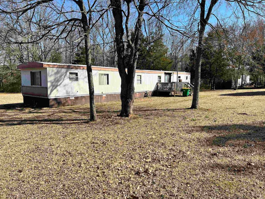 Affordable investment opportunity! This multi-lot package in Jacksonville offers a mix of potential and value. The property is mostly level and naturally beautiful, making it ideal for a private homestead, or a long-term investment. The lots are divided into two sections: three lots together on one side of the road and eight adjoining lots just across the road. A mobile home is on-site and will be sold as-is, offering the option to renovate or remove. This is a great opportunity- call today for more details! Agents see remarks for details.