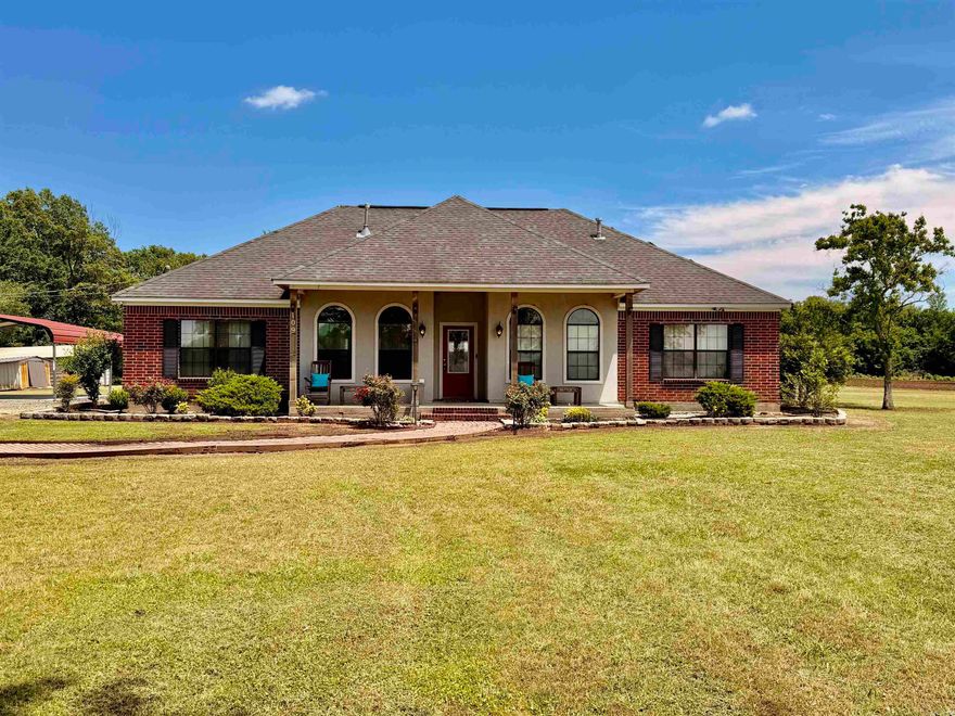 Looking for a country living feel while being in town? This is the property for you! This beautiful 4 bedroom, 2.5 bath home offers 2018 sq ft of comfortable open concept living space. Built in 2016, this lovely property boasts modern updates such as beautiful granite countertops and tile work in kitchen and master bath. Situated on 3 acres, this property provides the perfect blend of convenience and privacy-being close to town amenities while still feeling tucked away in the country. Enjoy spacious living, beautiful surroundings, and a quiet setting that feels like home. Contact Kara Beth today at 870-501-2500 for more information!