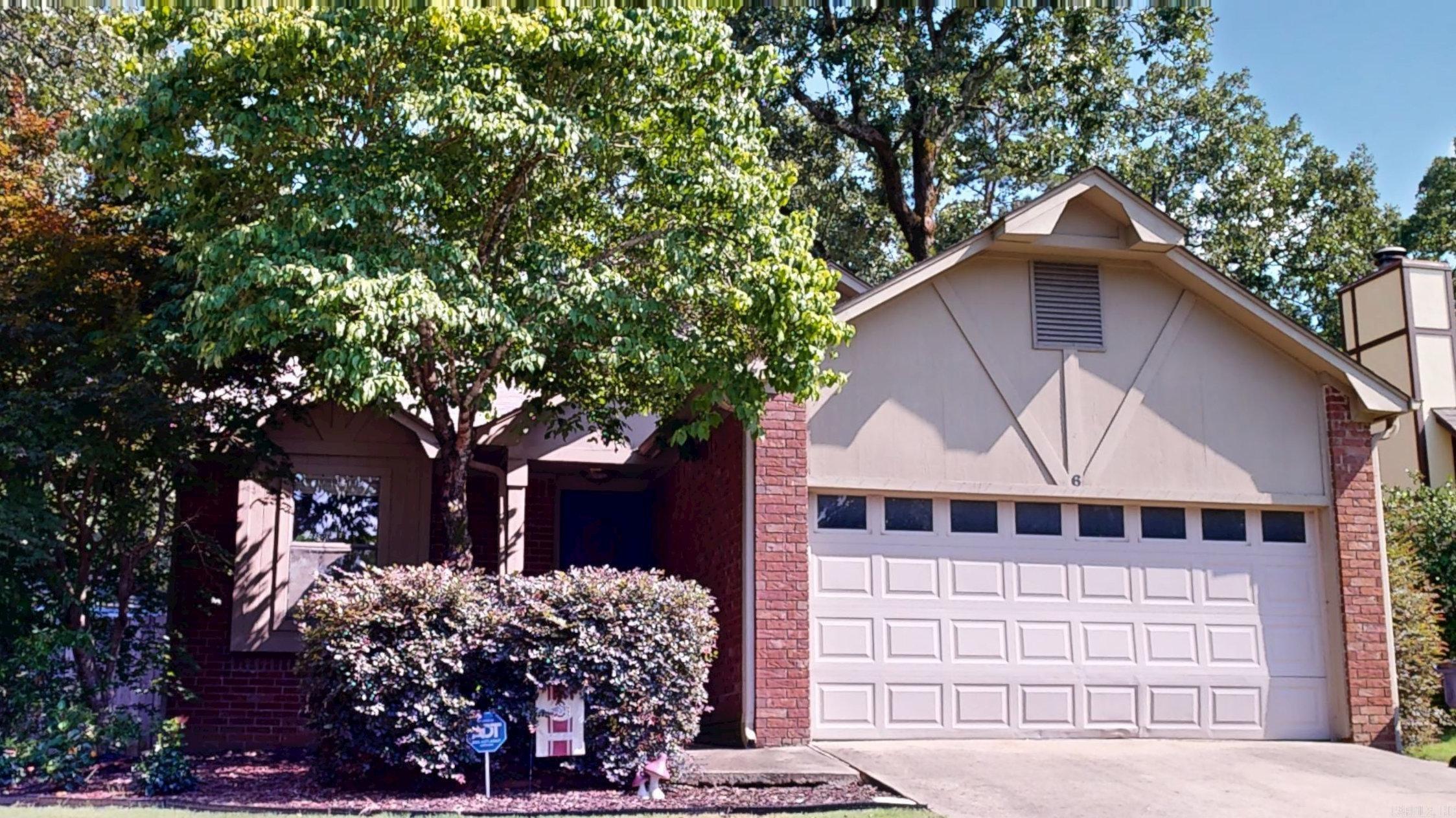 Welcome Home to 6 Oak Forest Loop. This charming single-story residence at 6 Oak Forest Loop offers an efficiently designed living space. The living room serves as the heart of the home, boasting a brick fireplace, vaulted ceiling, and hardwood floors. The kitchen offers updated appliances with a pass-through window. The attached garage provides ample parking and storage. Outside, the property indulges with a detached cooled and heated office within a privately fenced yard and entertaining area. You'll quickly find this part of a quiet residential neighborhood nestled in a family-friendly town that Maumelle has become known for. Be sure to check out the Matterport 3D virtual tour for an immersive walk-through with dollhouse and unfurnished views!!! https://my.matterport.com/show/?m=iMvAYDa9bWb&brand=0
