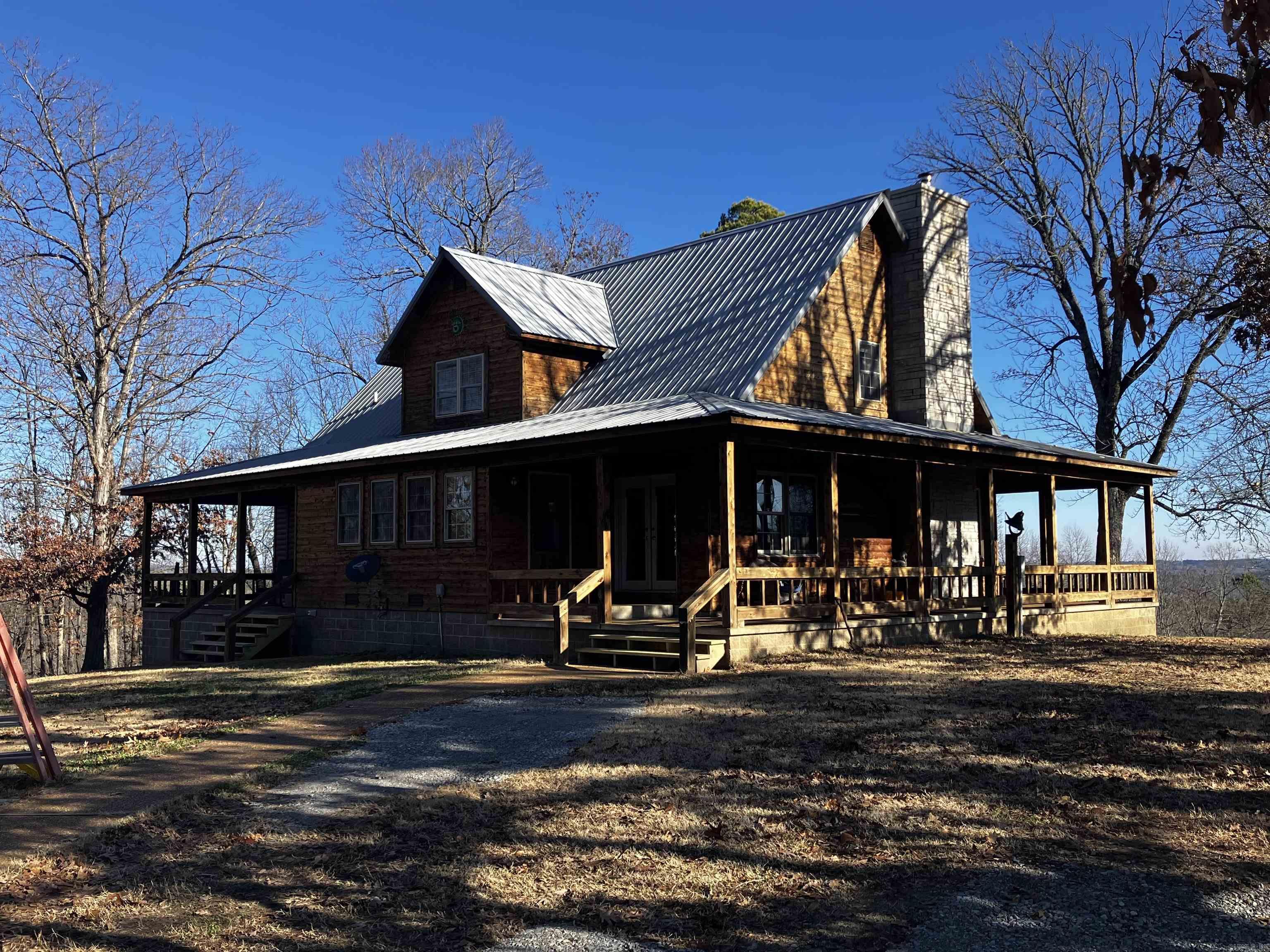 2566 SQ. FT. 4 BDR. 2.5 BATH HOME ON 32.5 ACRES M/L. OFFICE AREA, LOG SIDING, WRAP AROUND PORCH. ENJOY THE BEAUTIFUL OZARK MOUNTAINS FROM INSIDE YOUR HOME. 24X24 SHOP, 2 SMALL PONDS, SMALL WET WEATHER CREEK. STORM SHELTER. WILDLIFE DEER, TURKEY, SQUIRRELS. PROPERTY IS AT THE END OF THE ROAD AND ONLY A SHORT DRIVE TO TOWN. PROPERTY IS MOSTLY WOODED, GREAT VIEW. MUST SEE TO APPRECIATE.