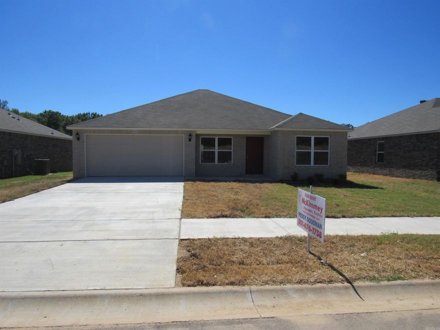 This home features a split floor plan with 4 bedrooms, 2 bathrooms, a spacious master suite with a walk-in shower in master bath, and a stunning kitchen/dining area fully equipped with energy-efficient appliances, ample counter space, and a convenient pantry.