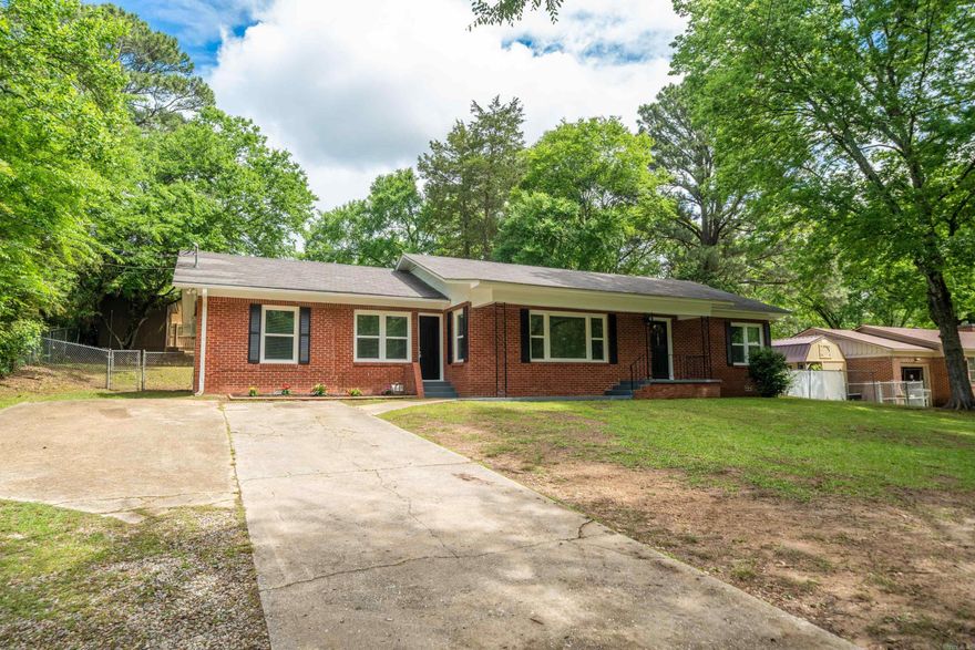 Beautifully renovated 3-bedroom, 2-bathroom brick home located in the highly desirable Lakeside School District—just across the street from Hot Springs Country Club! There is 1,780 square feet of comfortable living on a spacious 0.4-acre lot that offers modern living in a peaceful, established neighborhood. Inside, you’ll find a bright and open layout featuring brand new luxury vinyl plank flooring, fresh paint throughout, new appliances in the kitchen, new water heater and an abundance of natural light coming in through the brand new windows. A spacious bonus room with built-ins provides flexibility for an office, playroom, or second living area. Both bathrooms have been tastefully refreshed with modern fixtures. Enjoy outdoor living on the large covered back patio overlooking a fenced-in backyard with a storage building for all your outdoor equipment and tools. A long paved driveway provides ample parking. The primary suite offers a walk-in closet and easy access to the laundry room. Built in 1960, this single-family home blends classic character with modern updates. Just minutes from Oaklawn, shopping, and dining, this move-in ready home blends location, style, and convenience.