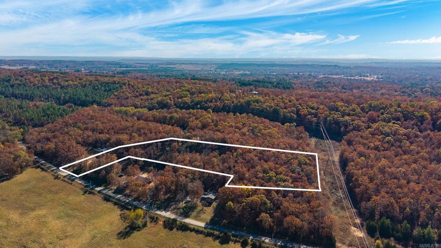 Looking for a spot in Greenbrier with no restrictions and a view. This is it. There is an area cleared that would make a good place to build a home or build higher up the hill. Clear a few trees for an outstanding view.