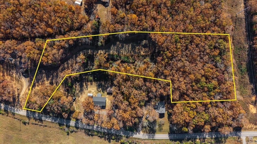 Looking for a spot in Greenbrier with no restrictions and a view. This is it. There is an area cleared that would make a good place to build a home or build higher up the hill. Clear a few trees for an outstanding view.