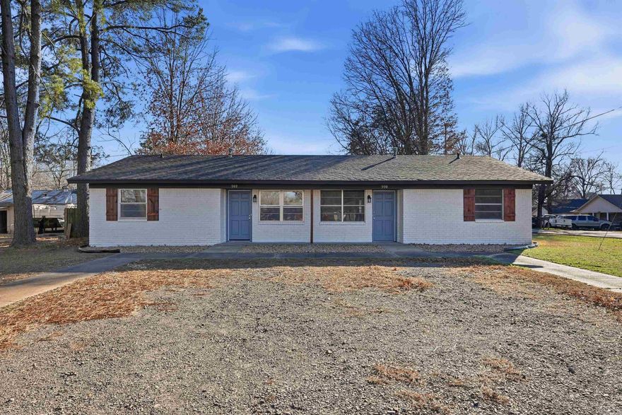 Brick Real Estate is proud to present this turnkey duplex in Russellville, AR offering an excellent opportunity for investors or owner-occupants looking house hack.  Each unit features a 2 bed / 1 bath layout with extensive recent renovations throughout.  Major updates include a new roof, both HVAC systems replaced, new electrical, fresh exterior paint on doors, brick, and trim, and updated rock landscaping. Interior improvements include new flooring, new paint, quartz countertops, stainless steel appliances, tile backsplash, and new tile showers. One unit features brand-new cabinets, adding additional value.  Conveniently located near Arkansas Tech University, shopping, dining, and local employers with strong rental demand. Ideal for buyers looking to rent out one side, while living in the additional unit or investors looking for a low-maintenance, updated asset.