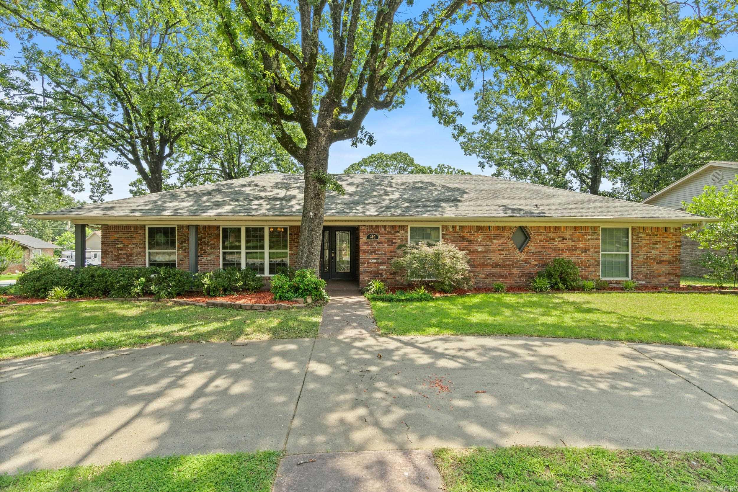 Welcome to your summer oasis! This charming home, nestled on a corner lot in the heart of Sherwood, is perfectly poised for warm-weather enjoyment. Step into spacious rooms designed for comfortable living, with two distinct living or entertaining areas perfect for gathering. Discover the oversized pantry, offering lots of storage for all your needs. Enjoy the bright and airy large sunroom, ideal for year-round relaxation. The highlight of this property is undoubtedly the beautiful pool, inviting you to relax and entertain all summer long. Get ready to make lasting memories in this fantastic, summer-ready home!
