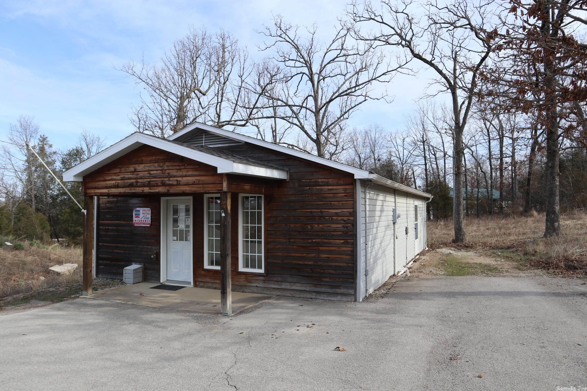COMMERCIAL BUILDING AND LOT WITH US HWY. FRONTAGE FOR SALE Description: Property is located at 316 Hwy 62/412 E in Salem, AR. Great business location with high traffic for your business. The building has approx. 960 sq. ft. of area with lobby, 2 offices, bathroom and large storage area. Would also make a good rental income property.