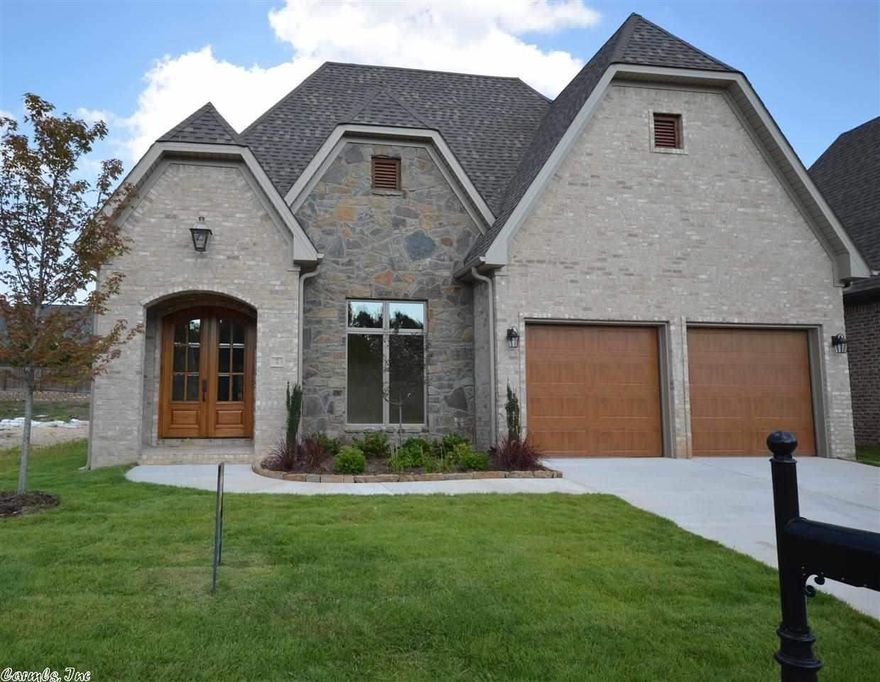 Luxurious NEW one level patio home in a gated neighborhood. POA dues pay for lawn care as well as to maintain the roads and gate. Your buyer's will love the French Country architecture, Travertine floors, 2 fireplaces, gourmet kitchen, tall ceilings and more. 3 large bedrooms PLUS an office. 2 separate eating areas.  Large covered porch. Get in early to pick out paint colors, granite etc. Thank you for showing.