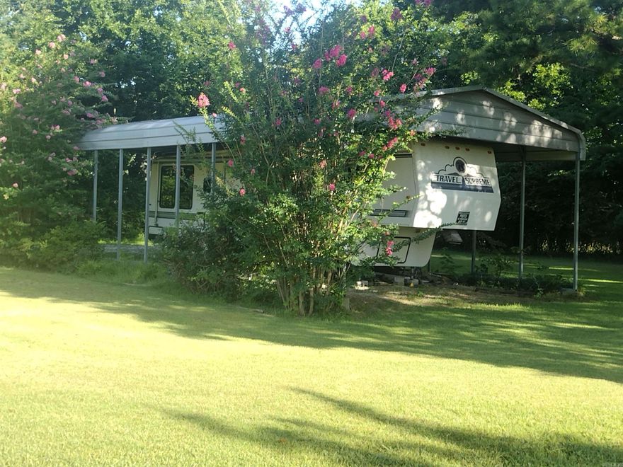 Corner lot with mountain views approx. .3 to the courthouse square RV and RV shed convey with property, is being used as Airbnb