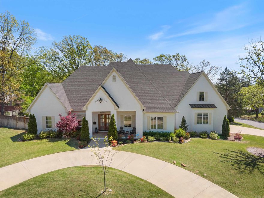 Stunning 2020-built home in Pleasant Valley offering timeless architecture and high-end finishes throughout. Located on a corner lot adjacent to the Pleasant Valley Golf Course, this 4 bedroom/4.5 bathroom home offers a wonderful floor plan. Main level highlights include: a formal dining room, office with French doors and built-in cabinets, and a great room with fireplace and beautiful custom cabinetry. The chef’s kitchen boasts KitchenAid appliances: a commercial gas range with pot filler, double ovens, built-in fridge/freezer, walk-in pantry, and a wet bar in the breakfast area. The main-level primary suite offers a spa-like bath and spacious walk-in closet. A guest suite is also on the main level. Upstairs has two bedrooms with private baths and walk-in closets, a large game room, attic access, and a 2nd laundry service. Outdoor features include a screened porch with fireplace, fenced backyard, circular drive, and side-entry 3-car garage. Additional features include: sight finished hardwood floors, 10’ ceilings and 8' doors on the main level, 9’ ceilings upstairs, Pella windows and doors, mud room and incredible main level laundry room with beautiful design! See agent remarks!