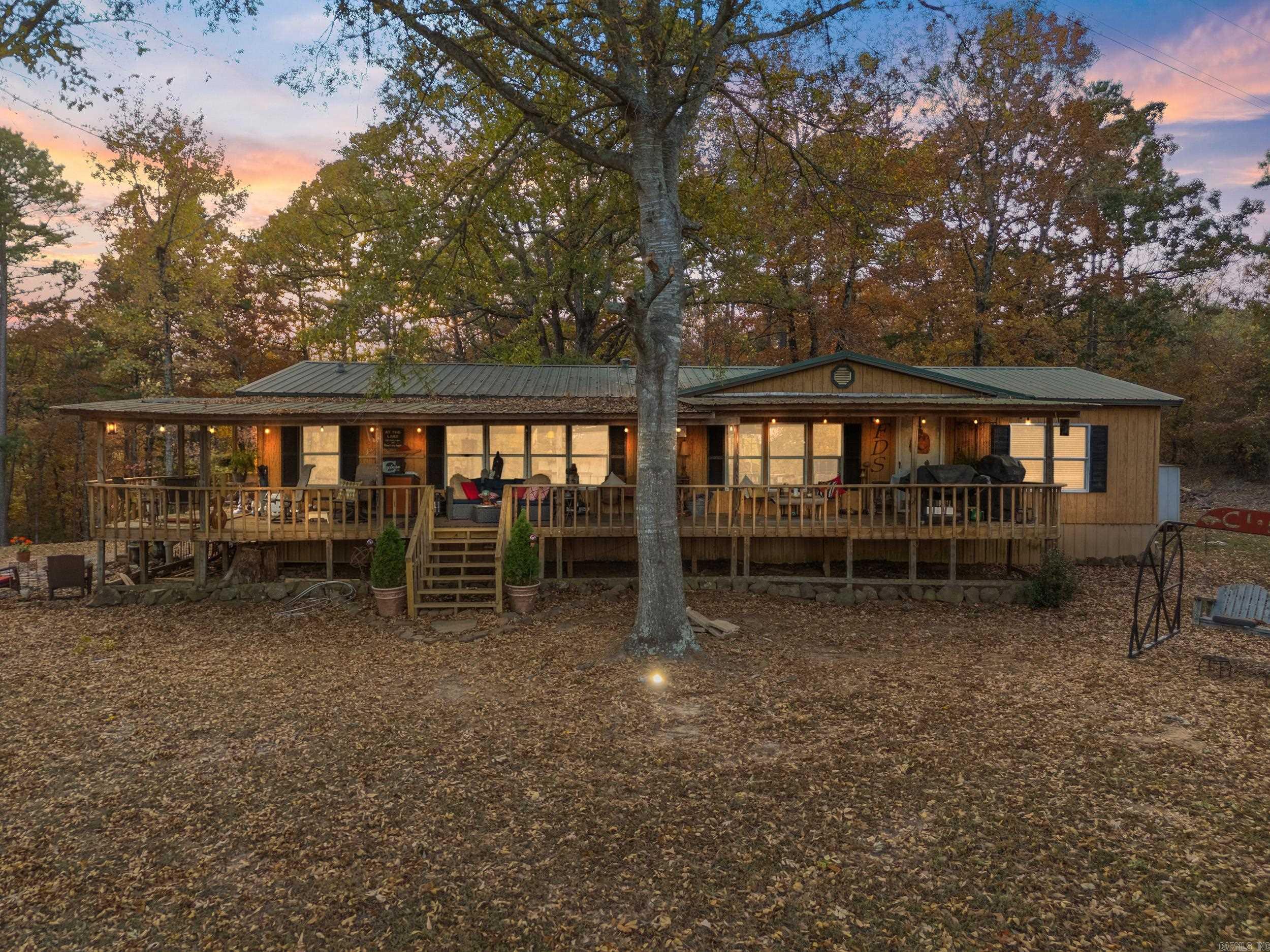 Welcome to lake life! Stunning lake front property that has been completely remodeled and sits perched on the banks of Middle Fork at Greers Ferry Lake!! The home boasts 3 bedrooms and 2 bathrooms and sits at just under 1600 sqft of living space with an absolutely amazing covered patio with a stunning view or the lake and mountains! A short walk through your almost 1.3 acres to the waterfront lets you enjoy everything the lake has to offer and get back off the lake rather quickly and relax with friends and family!! The property is a stone’s throw away from Janssen's lakefront resort. Don’t miss your chance to see this gem before it’s gone!! Call or text list agents to schedule a showing!