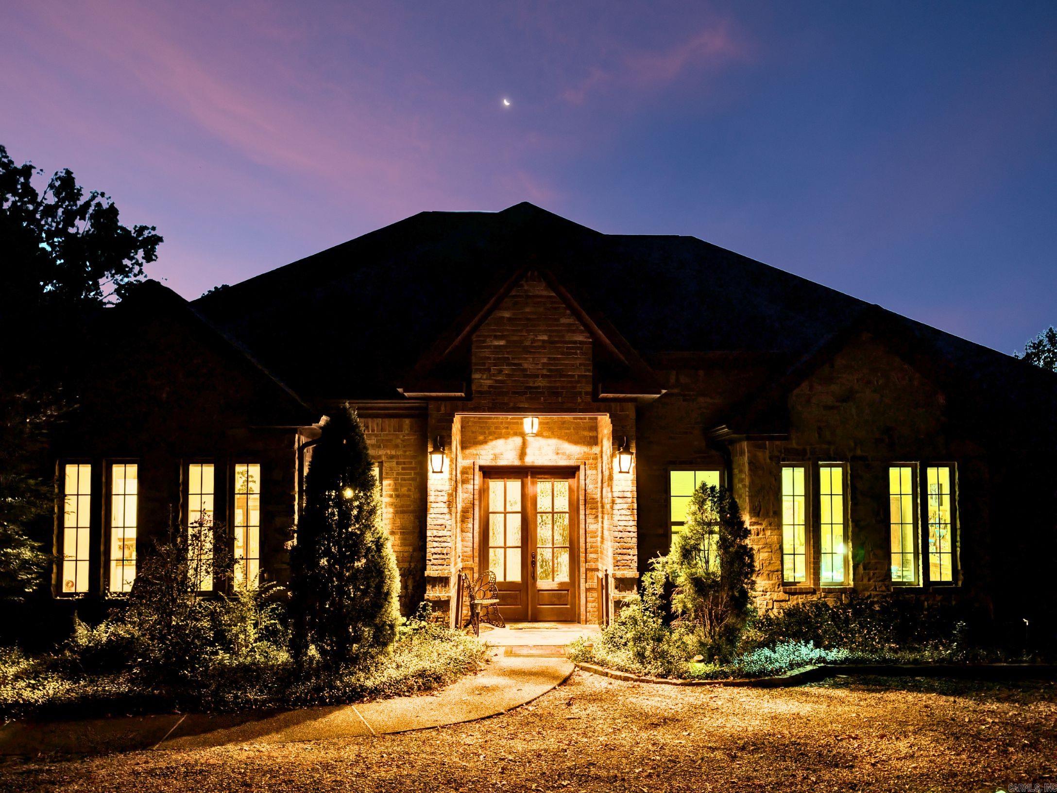 YOU HAVE TO SEE BEHIND THE GATE TO APPRECIATE STONY SPRINGS FARM! This is an 80 Acre Farm in Jessieville School District with a 3600 sqft Primary Home Custom Built by Carriage Homes! Beautifully Designed with special features inside and out, this home offers 3 beds, 3.5 baths, office, dining room, custom cabinetry with extra counterspace, gas range, double oven, separate wet bar with ice maker & wine cooler, large pantry, bonus storage room, & partially finished space above garage. Primary suite has spacious bathroom with tub, walk-in shower, & large closet with built-ins. Both guest rooms have their own large bathrooms with large custom showers. Covered patio is one-of-a-kind with ample seating, grilling area, and gorgeous water feature. Oversized 3 car garage with extra parking pads. The 82 acres also includes a 4 bed 2 bath 1600 sft guest house, a 1 bedroom cottage, a large horse arena, a greenhouse, a big 32 x 39r red livestock barn, a weaning pasture, a piney hill, 3 ponds, & a new 40X50 shop & MORE! Property includes all of the following addresses! Seller is willing to subdivide! See additiona listings for acreage and guest home! 10850 N HWY 7 , 10852 N HWY 7 , 10854 N HWY 7