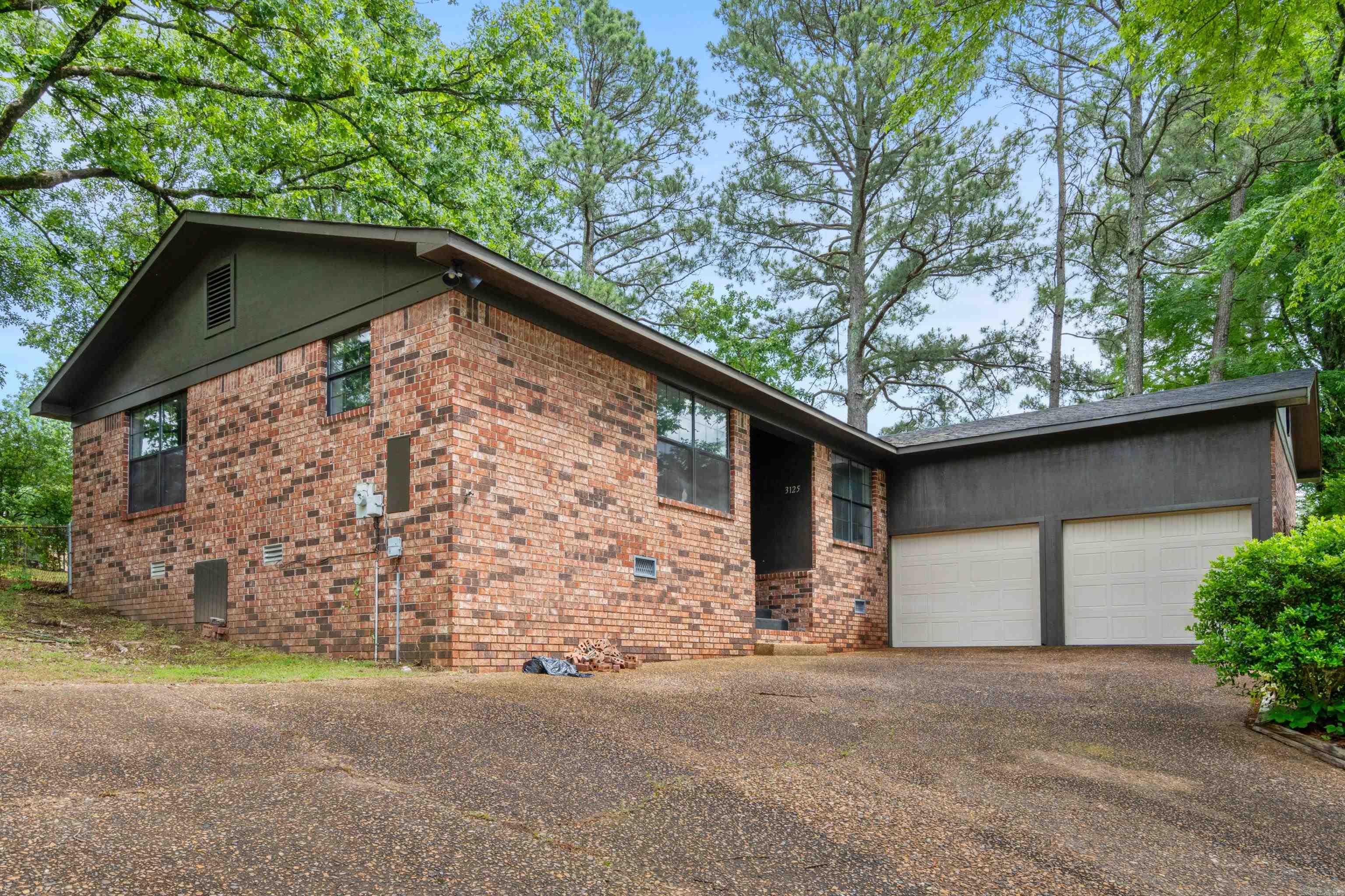 Step into style and leave your toolbelt at the door—this 3 bedroom, 2 bath home in the sought-after Lake Hamilton School District offers 1,477 square feet of stylish updates and modern comfort. Inside, you’ll find brand-new luxury vinyl plank flooring, fresh paint throughout, quartz countertops, and upgraded Kohler sinks and faucets in both the kitchen and bathrooms. The kitchen features new tile and updated lighting, while new interior doors add a clean, cohesive feel throughout. The exterior has been freshly painted, and major upgrades include a new roof, a new HVAC system installed in 2022, and brand-new garage doors. A double-door garage and fully fenced yard complete this turnkey property, offering peace of mind, polished finishes, and a location that’s hard to beat. This property also qualifies for a rural development loan! Message me or your realtor to schedule a viewing!