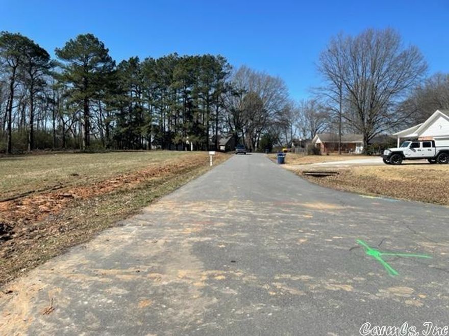 Build your dream home on a huge 1.2 acre lot in an established well known neighborhood or subdivide into the 3 1/2 Lots and build on a portion of the land. Property consists of 348 ft. wide by 150 ft. deep. Water and sewer are available and waiting on a new owner. This property has been surveyed and appraised.