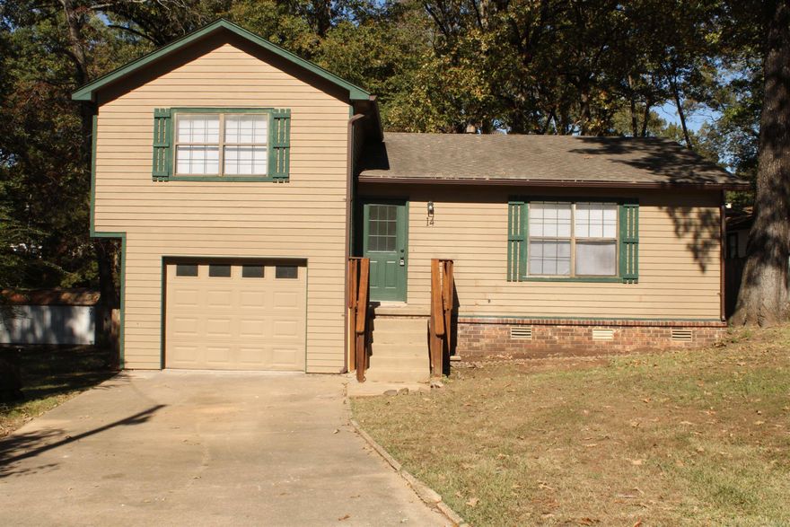 New paint, floors, kitchen sink, updated counter tops, cabinets have been painted, new toilets and bathroom vanity's, and all new light fixtures.  3 bed split floor plan, 1.5 bath home outside of town. Privacy fenced in backyard, shed, and one car garage with insulated door. Lots of updates