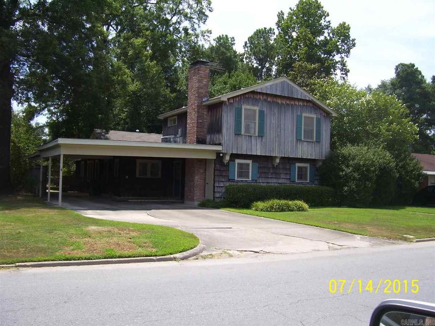 Ideal for a large family. This house features 6 bedrooms, 3 full baths along with a living room and den with wood burning fireplace. Call to view today! $89,500