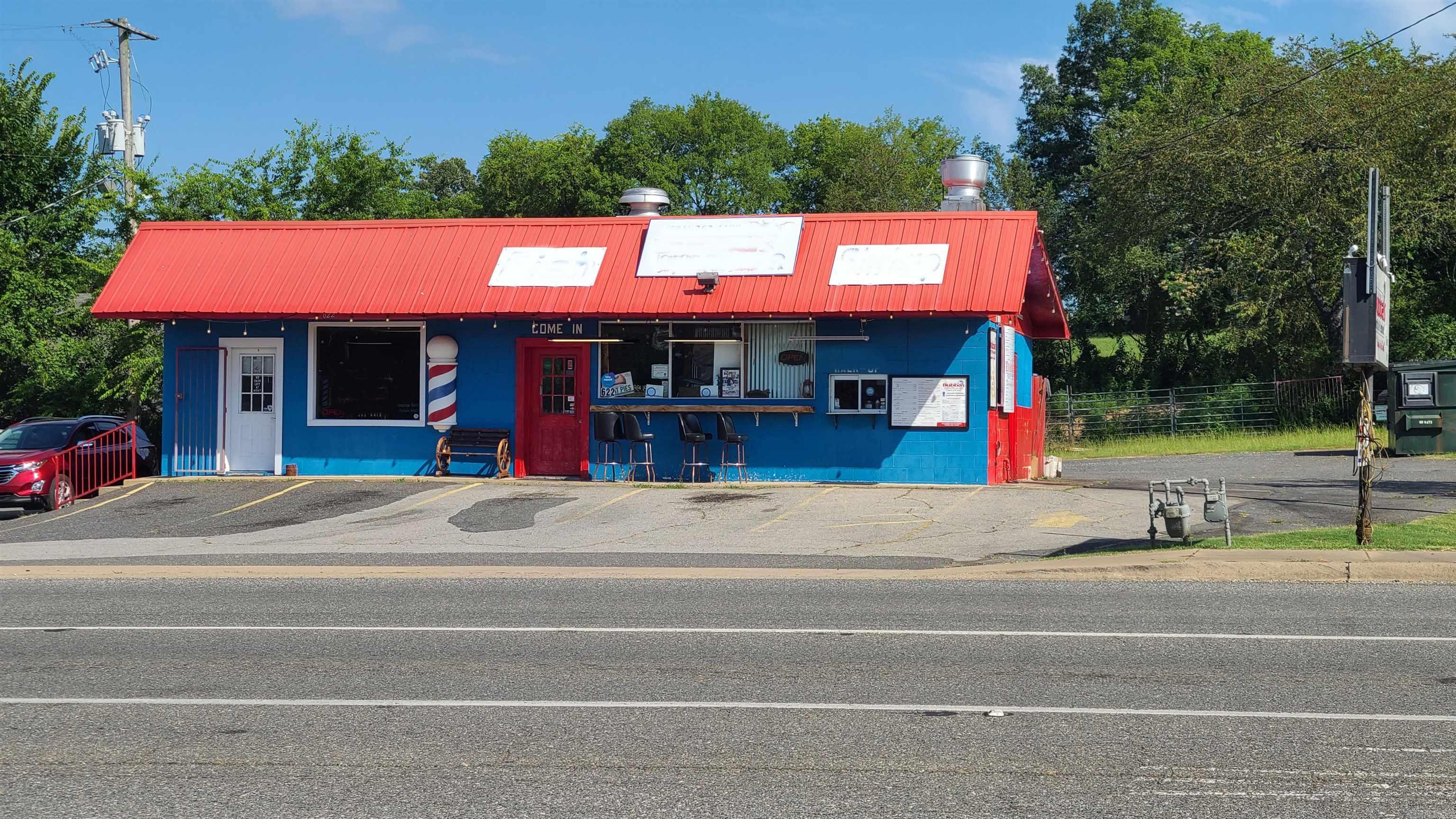 Income and real estate or 100% new owner use. Building is 1,076 sf+/- with two functioning Retail spaces. Located at busy stop light intersection.