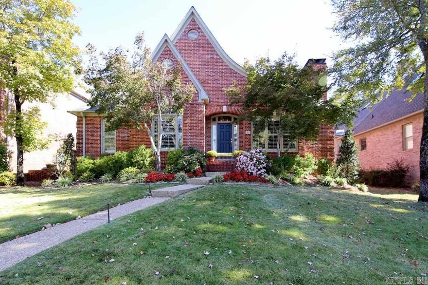 Beautiful Patio home on private lot with rear entry from private drive.  Two story entry.  Large great room with wbfp.  Open kitchen with slab granite to table area, large island, and den (this was formal dining).  Master suite with luxurious master bath.  Two bedrooms with hall bath.  Separate half bath and laundry rm.  Upstairs has large bedroom or bonus room with full bath.  Walk-out attic storage.  Covered patio with flagstone and waterfall.  Must see!