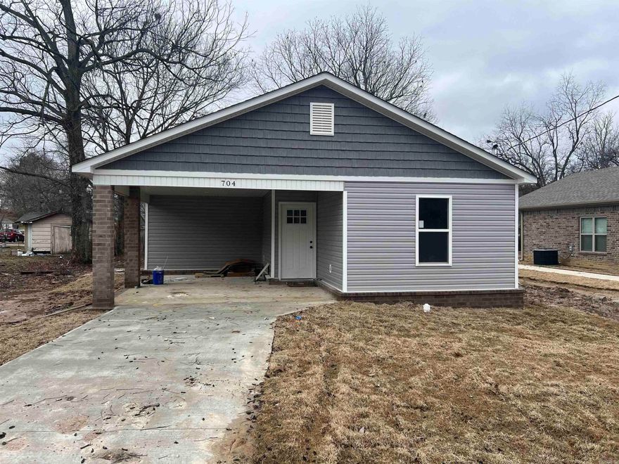 New Construction 3-bedroom 2 bath.  Living/Kitchen/Dining Combo great for entertaining.  Primary bedroom apart from guest bedrooms. Primary bedroom has separate large walk-in closet and bath.  Concrete flooring, stainless appliances and a one car carpet. One year builder warranty and one year termite contract.  Taxes lot only.