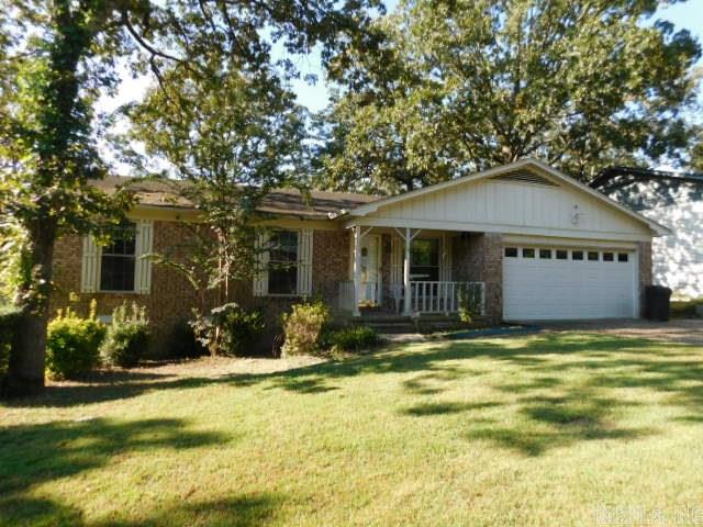 Lots of living space with this one located on a cul-de-sac! Nice size living room PLUS a large den with cathedral beamed ceiling, log pine walls and a corner fireplace. Nice sized kitchen, 3 bedrooms, 2 baths, 2 car garage, under house storage and a very large backyard for the kiddos or pets. Enjoy the convenient location of being close to schools, shopping and entertainment.
