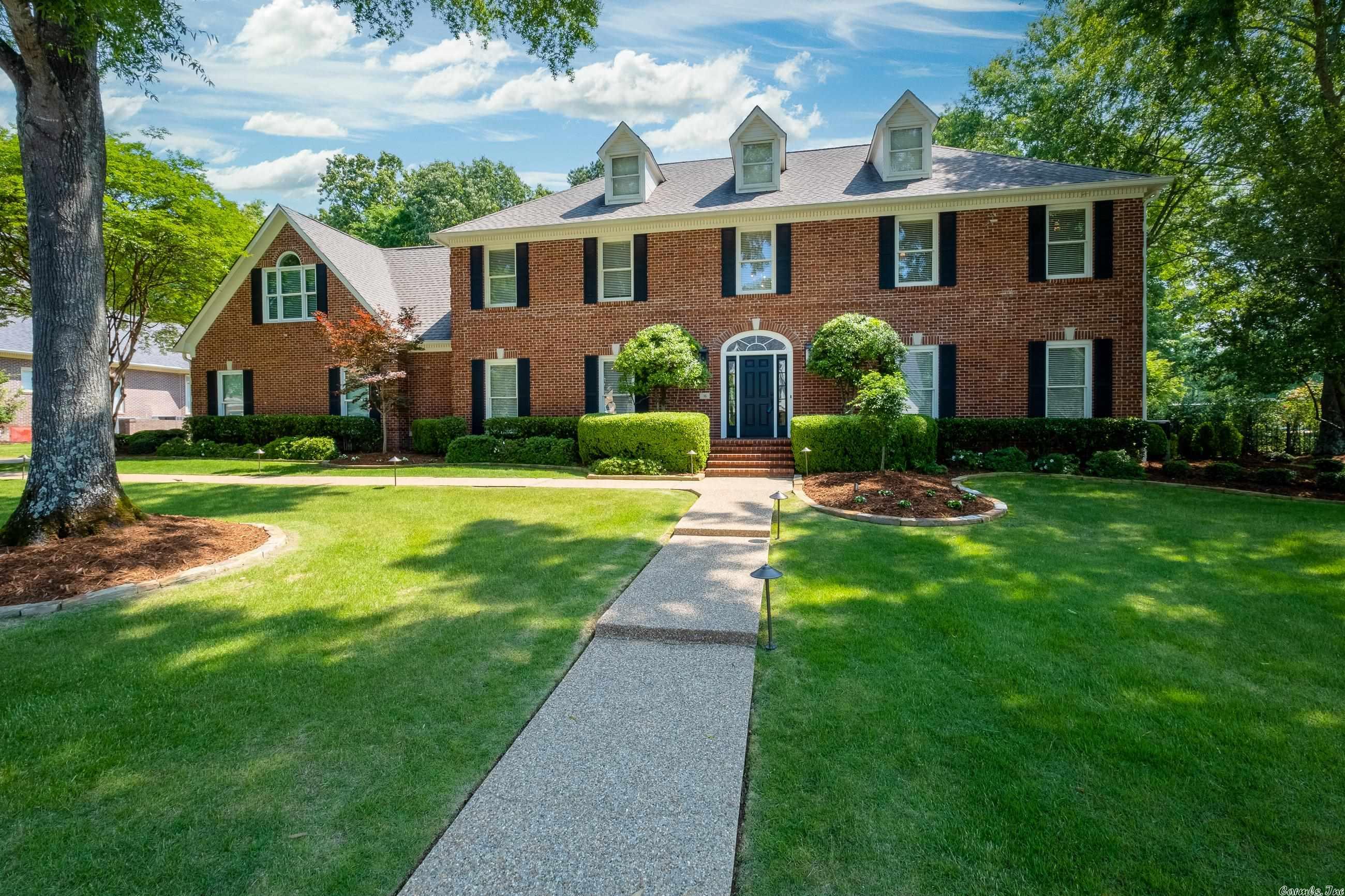 Impeccably maintained and stately traditional family home backing to Founders Golf Course in Chenal. Gorgeous finishes, handsome HDWD floors, spacious rooms and serene backyard. Kitchen totally remodeled with custom cabinets, quartz & granite counters, storage & SS appliances. Great Room w/Gas FP and French doors opening to covered patio w/WBFP. Primary suite is a retreat with heated floors in updated spa bath. Three guest BDRMS each with bath access + bonus and office. Plenty of storage closets. Come See!